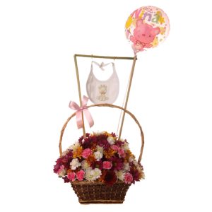 Primaveras con baberito en linda canasta